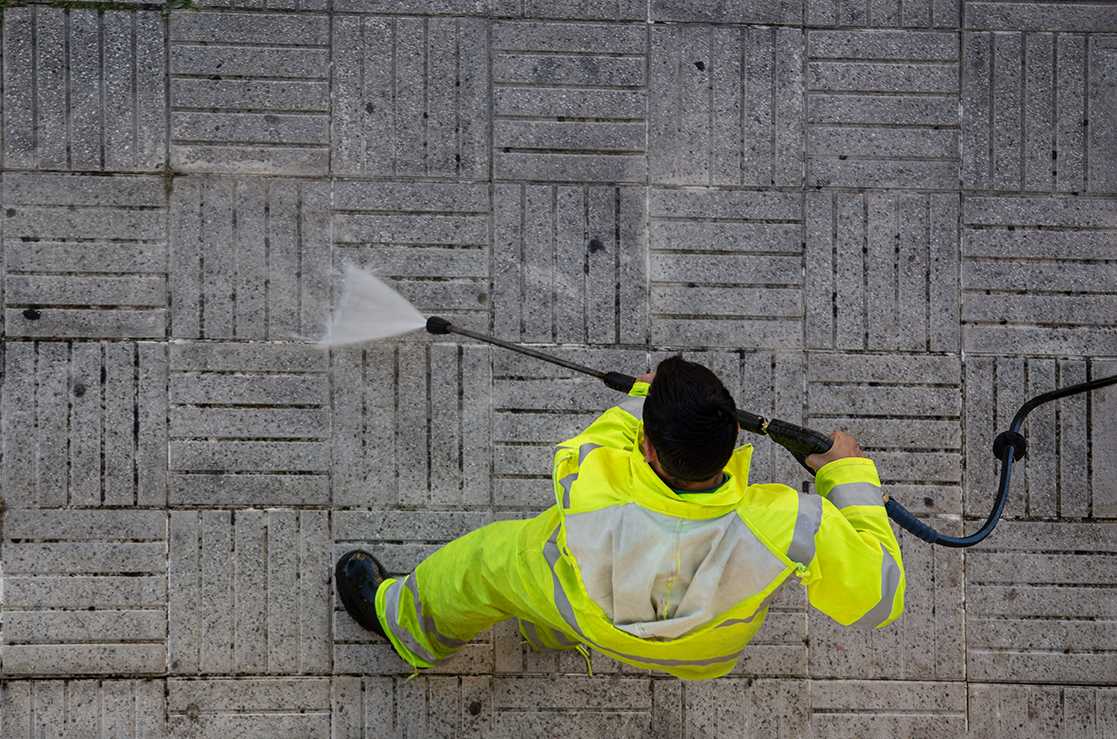 worker-cleaning-street